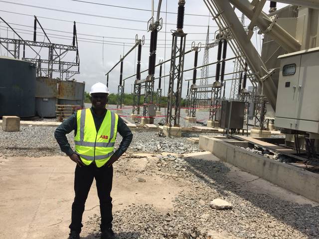 On site in ABB high-visibility gear at an outdoor transmission substation